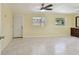Open living area with tile floors, natural lighting, and outdoor access at 1810 77Th N Ave, St Petersburg, FL 33702