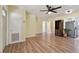 Spacious living room featuring luxury vinyl plank flooring, neutral paint, and a functional open layout at 1810 77Th N Ave, St Petersburg, FL 33702