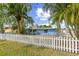 Charming single-story home with a white picket fence at 1818 Indian Rocks Rd S, Largo, FL 33774