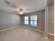 Bedroom featuring neutral paint, a ceiling fan, and tile flooring at 1881 Colding Dr, Ruskin, FL 33570