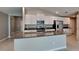 Modern kitchen with granite countertops, stainless steel appliances, and white cabinetry at 1881 Colding Dr, Ruskin, FL 33570