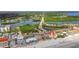 Aerial view of beachside condos near a bridge, providing easy access to the city at 19010 Gulf Blvd # 203, Indian Shores, FL 33785
