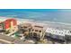 Aerial perspective highlights the desirable beachfront property with captivating views of the ocean and surrounding landscape at 19010 Gulf Blvd # 203, Indian Shores, FL 33785