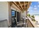 Comfortable balcony seating with beach views, perfect for relaxing outdoors at 19010 Gulf Blvd # 203, Indian Shores, FL 33785