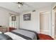 Bedroom with carpet flooring, closet, and an ensuite bathroom at 19010 Gulf Blvd # 203, Indian Shores, FL 33785