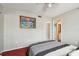 Bedroom with carpet flooring, closet, and an ensuite bathroom at 19010 Gulf Blvd # 203, Indian Shores, FL 33785