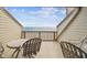 Balcony with outdoor seating and scenic ocean views, perfect for relaxing at 19010 Gulf Blvd # 203, Indian Shores, FL 33785