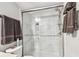Shower area with glass doors and marble wall is the focal point at 19010 Gulf Blvd # 203, Indian Shores, FL 33785