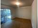 Bedroom featuring carpet floor, sliding glass doors, and natural lighting at 213 Mahogany Dr, Seffner, FL 33584