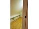 Attic space with wood floors and built-in shelving for organized storage at 2615 Southern Oaks Pl, Plant City, FL 33566