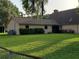 Large back yard with lawn and chain link fence at 2615 Southern Oaks Pl, Plant City, FL 33566