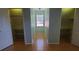 The bedroom features a window and large closets for storage at 2615 Southern Oaks Pl, Plant City, FL 33566