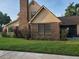 Charming residence featuring brick accents, mature landscaping, and a tidy lawn at 2615 Southern Oaks Pl, Plant City, FL 33566