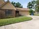 View of the home's garage and driveway at 2615 Southern Oaks Pl, Plant City, FL 33566