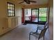 The screened porch offers a ceiling fan and a built-in counter area at 2615 Southern Oaks Pl, Plant City, FL 33566
