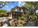 Charming two-story home with a brick accent wall and manicured front yard at 2665 Sequoia Ter # 306, Palm Harbor, FL 34683