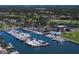 Aerial view of the marina with extensive boat slips and waterfront homes within the Pasadena Yacht & Country Club at 2817 Seabreeze S Dr, Gulfport, FL 33707