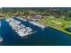 An aerial view of the marina, clubhouse, pool, and golf course at Pasadena Yacht & Country Club at 2817 Seabreeze S Dr, Gulfport, FL 33707