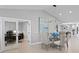 Cozy dining room with view into the office and kitchen at 2817 Seabreeze S Dr, Gulfport, FL 33707