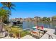 Home's private dock with boat lift and canal views at 2817 Seabreeze S Dr, Gulfport, FL 33707