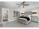 Spacious main bedroom with neutral walls and decor, bedside tables, and ensuite bathroom at 2817 Seabreeze S Dr, Gulfport, FL 33707