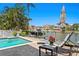 Seating area near the pool with a waterfront view at 2817 Seabreeze S Dr, Gulfport, FL 33707
