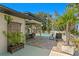Outdoor patio area with pool, lounge chairs, and covered seating, perfect for relaxation at 2817 Seabreeze S Dr, Gulfport, FL 33707