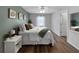 Bedroom featuring wood floors, neutral walls and ceiling fan at 2874 Deer Pine Trl, Land O Lakes, FL 34638