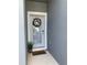 Charming front door with wreath, small potted plant and a welcome mat at 2874 Deer Pine Trl, Land O Lakes, FL 34638