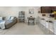 Inviting living space featuring a dining table, and a comfortable sectional at 2874 Deer Pine Trl, Land O Lakes, FL 34638