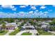 Street view featuring a home with solar panels and circular driveway at 2912 Case Ave, Bradenton, FL 34207