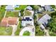 Aerial view of the home showcasing the solar panels and circular driveway at 2912 Case Ave, Bradenton, FL 34207