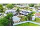 Aerial view of the property featuring a backyard, garage, and solar panels at 2912 Case Ave, Bradenton, FL 34207