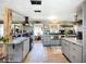 Updated kitchen featuring stainless steel appliances, granite counters, and spacious layout at 2912 Case Ave, Bradenton, FL 34207