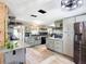 Open-concept kitchen boasts stainless steel appliances and granite countertops at 2912 Case Ave, Bradenton, FL 34207