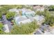 Aerial view of a condominium complex with mature landscaping and parking at 3002 W Cleveland St # C3, Tampa, FL 33609