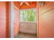 Exterior balcony with lattice work features colorful exterior and tropical landscaping at 3002 W Cleveland St # C3, Tampa, FL 33609