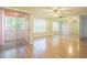 The living room has an exit to the balcony and large windows with natural light at 3002 W Cleveland St # C3, Tampa, FL 33609