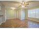 The living room features wood floors and an open concept with the kitchen at 3002 W Cleveland St # C3, Tampa, FL 33609