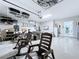 Finished garage space with storage, seating, and modern amenities, perfect for various activities at 34056 Scarlet Sage Ct, Wesley Chapel, FL 33545