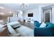 Spacious living room provides stylish seating, contemporary design, and comfortable living at 34056 Scarlet Sage Ct, Wesley Chapel, FL 33545