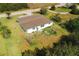 Aerial view of a single-story home with a spacious lawn at 3614 Vasco St, Punta Gorda, FL 33950