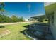 Covered front porch with decorative landscaping at 3614 Vasco St, Punta Gorda, FL 33950
