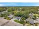 Aerial view of a charming neighborhood with tree-lined streets and well-maintained homes at 4019 W Bay To Bay Blvd, Tampa, FL 33629