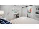 Bright bedroom features a vanity and ensuite bathroom with sliding barn door at 4019 W Bay To Bay Blvd, Tampa, FL 33629