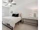 Serene bedroom featuring neutral colors, soft textures, a ceiling fan, and a light filled window at 4019 W Bay To Bay Blvd, Tampa, FL 33629