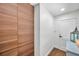 Entryway featuring dark wood cabinets, white walls, and a white door, showcasing the home's modern design at 4019 W Bay To Bay Blvd, Tampa, FL 33629