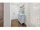 Inviting entryway with stylish cabinet, decor, and natural light from a window at 4019 W Bay To Bay Blvd, Tampa, FL 33629