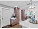 Kitchen with wood cabinets, white backsplash, and stainless appliances for a modern cooking experience at 4019 W Bay To Bay Blvd, Tampa, FL 33629