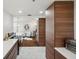 Modern kitchen with stainless steel appliances, white countertops, dark wood cabinets and an eat-in bar at 4019 W Bay To Bay Blvd, Tampa, FL 33629